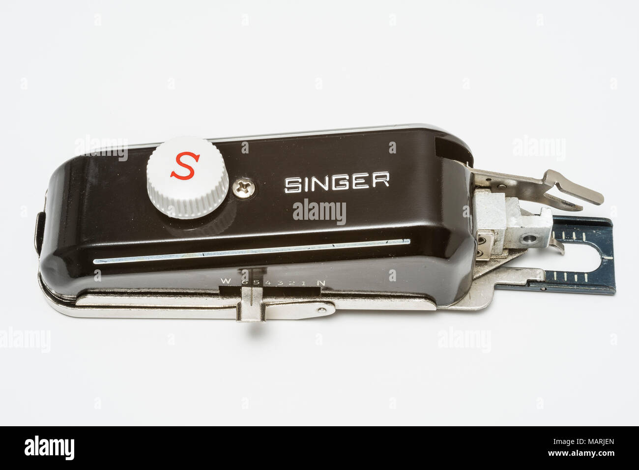 Buttonholer attachment for Singer sewing machines Stock Photo - Alamy