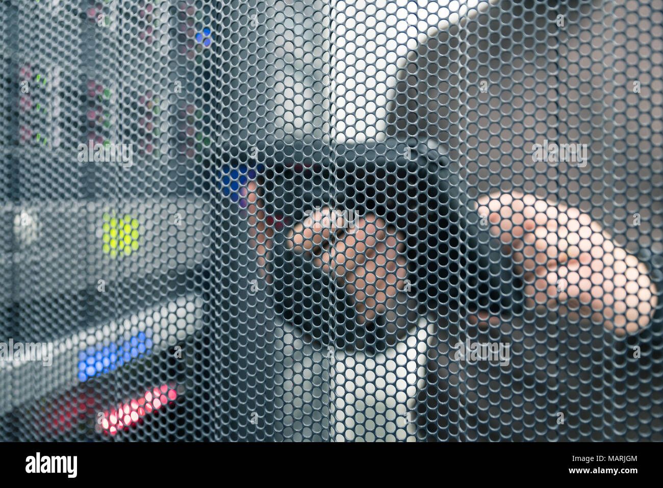 IT technology unfocused background with copy space for text, IT specialist with tablet in the server room Stock Photo