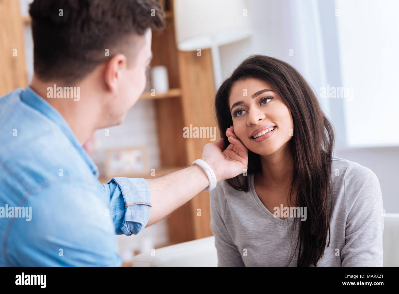 Man caressing beautiful woman in love Stock Photo