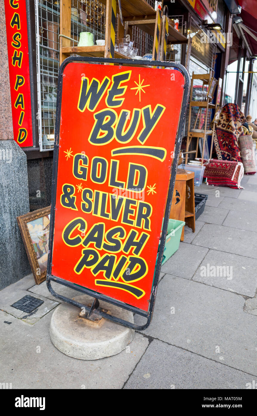 We buy gold sign outside shop, UK, London Stock Photo