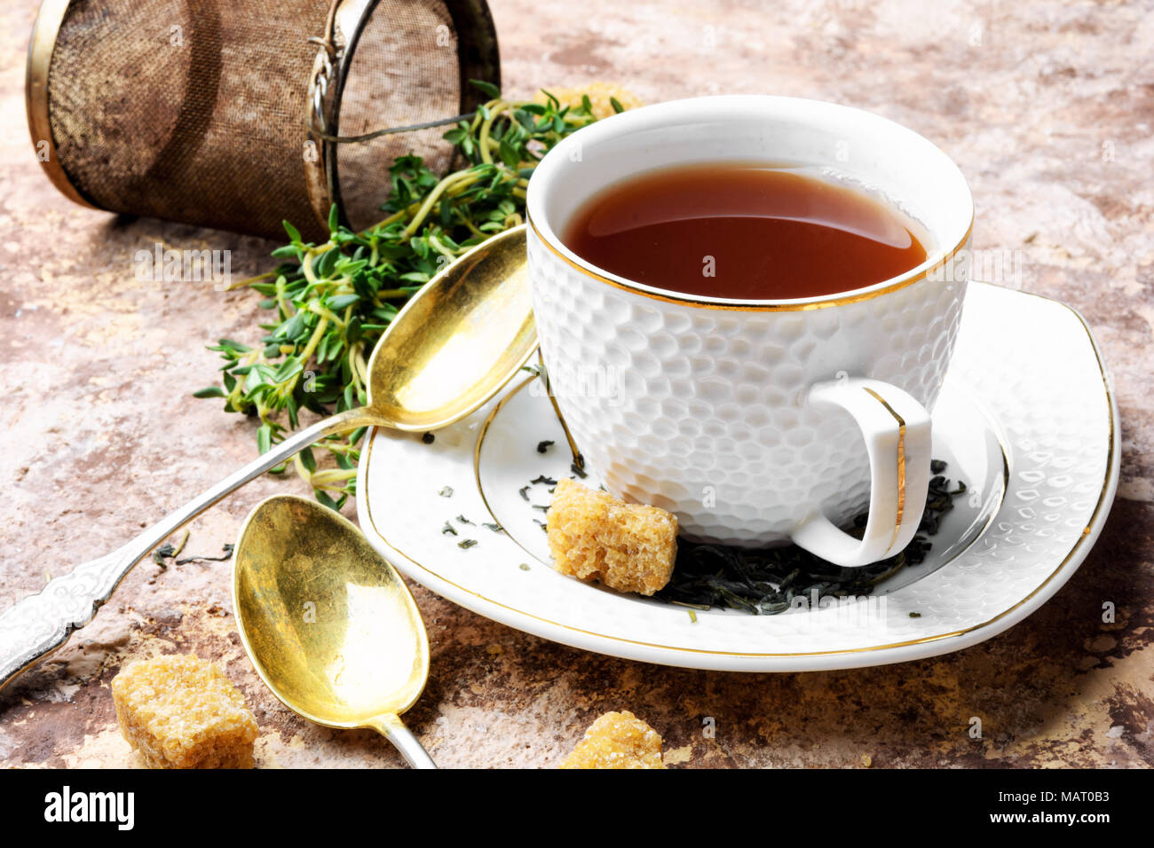 Cup of herbal tea brewed from the sprigs of fresh thyme Stock Photo Alamy