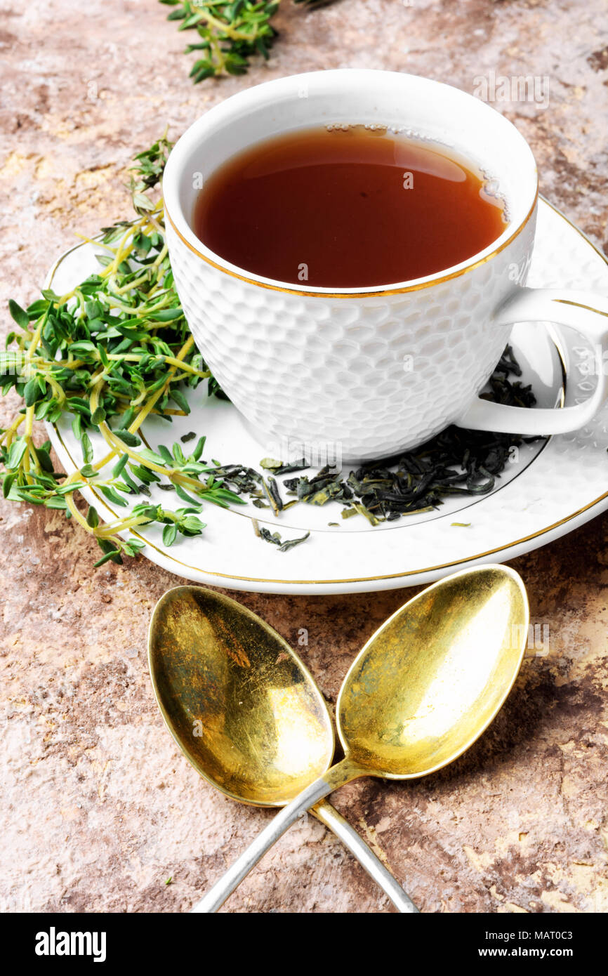 Cup of herbal tea brewed from the sprigs of fresh thyme Stock Photo Alamy