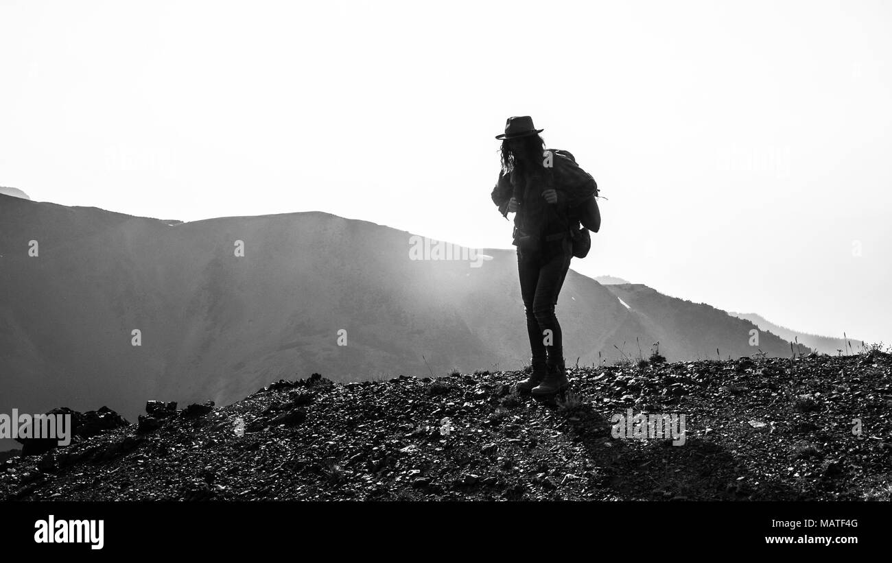 Female hiker in hat Black and White Stock Photos & Images - Alamy