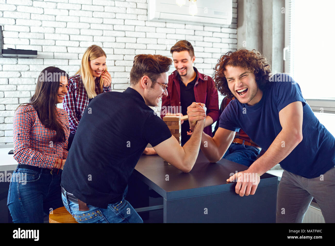 Group of friends having fun talking together in their spare time Stock Photo