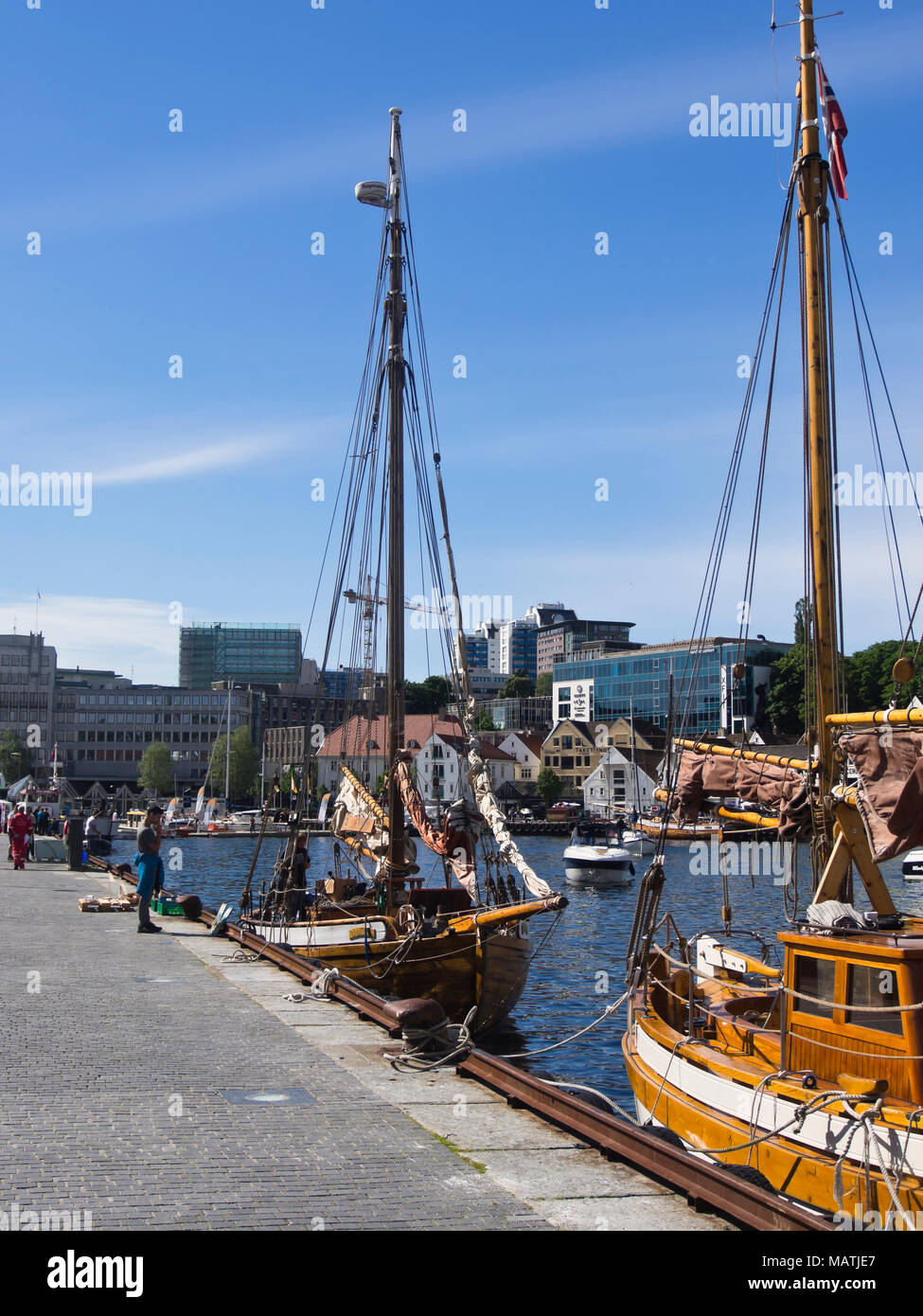 Vågen, the harbor in the centre of Stavanger Norway on a sunny summers day, old sail ships moored alongside Stock Photo