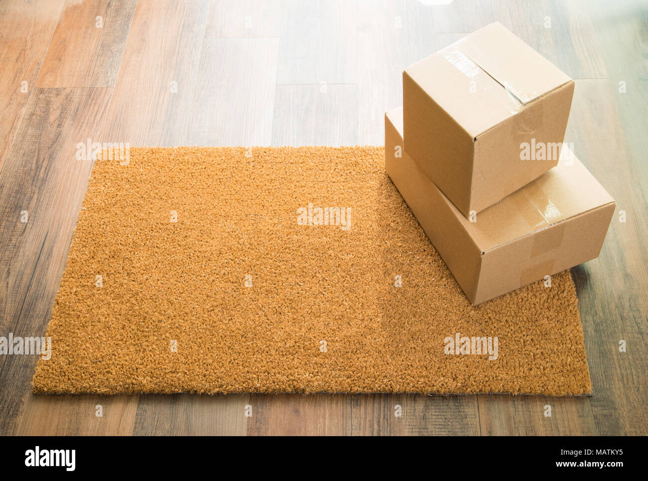 Blank Mat On Wood Floor With Shipment of Boxes Stock Photo Alamy