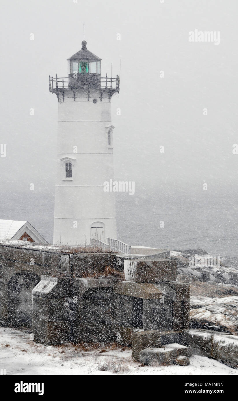 Portsmouth Harbor lighthouse during a blizzard snowstorm in New Hampshire. Stock Photo
