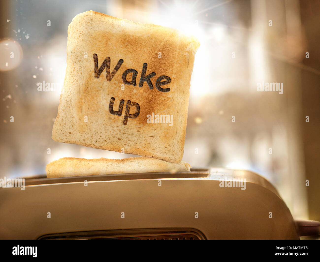 Toast bread jumps out of the toaster Stock Photo