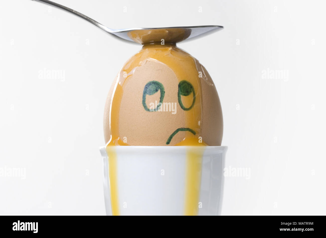 An unhappy, confused and dazed boiled egg. Stock Photo