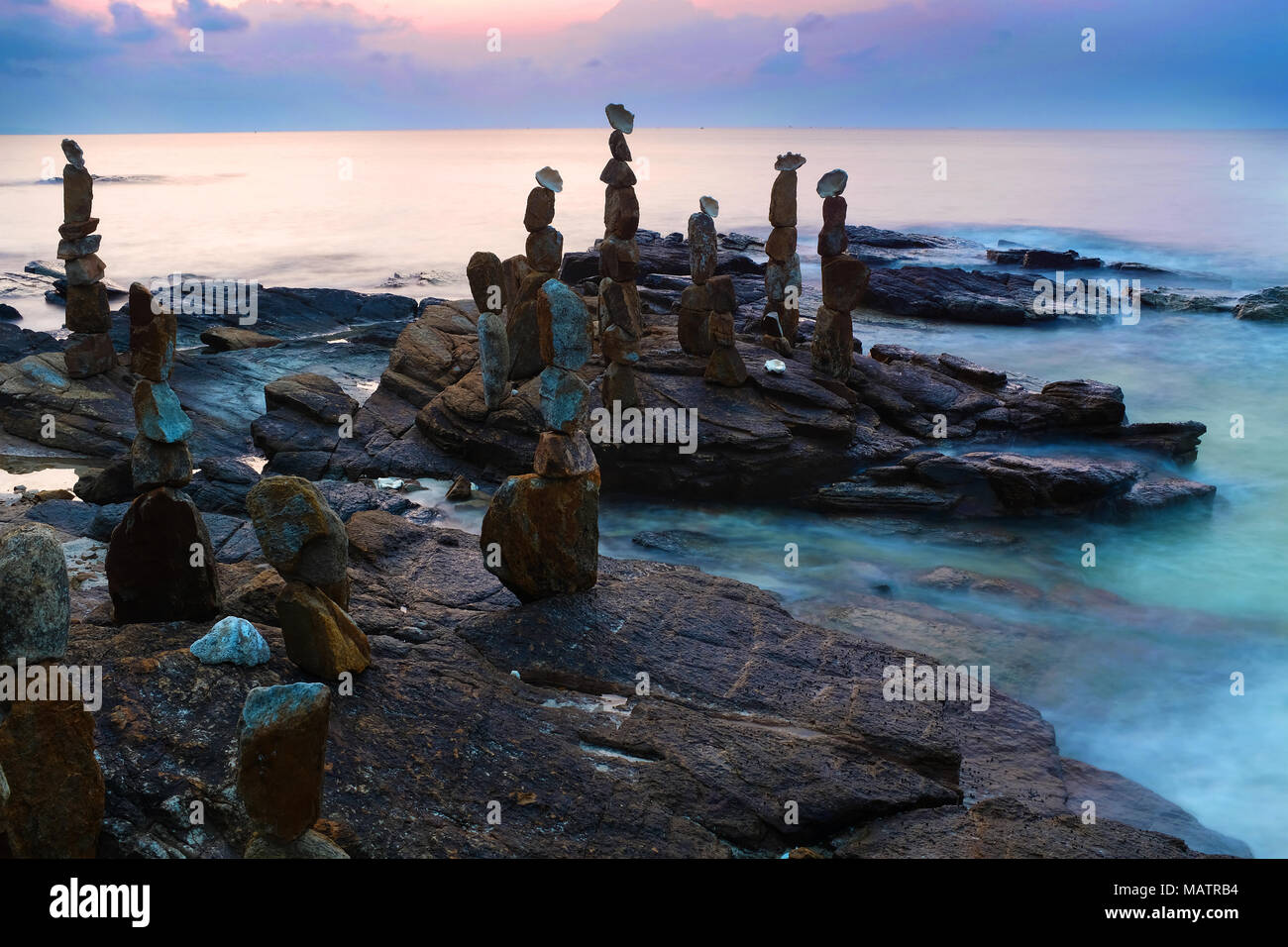 Balanced stones on foreshore, Ko Samed Stock Photo