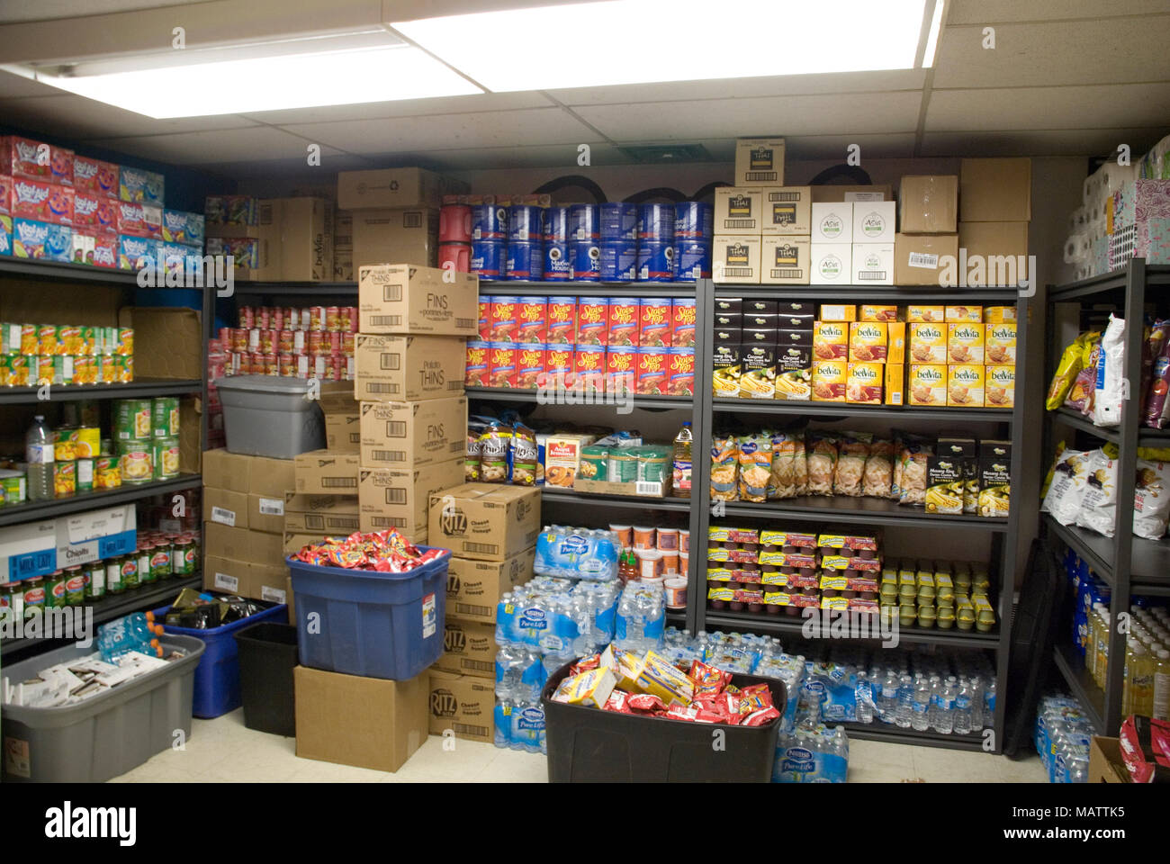 A pantry room of charity supplies within a Salvation Army Organization. Stock Photo