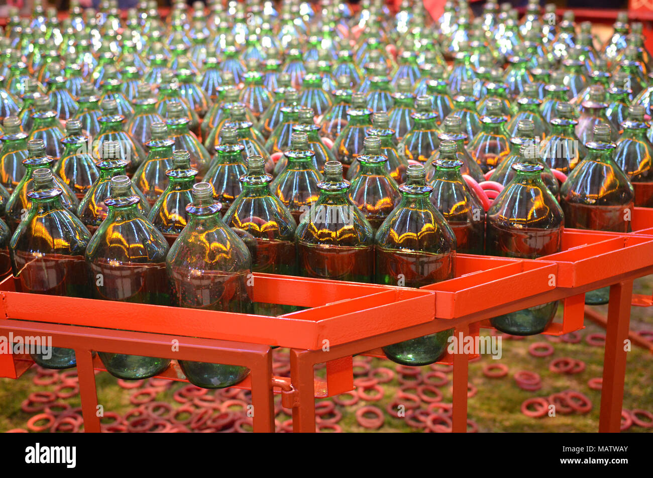Fairground glass bottle throw the hoop over a bottle game Stock Photo