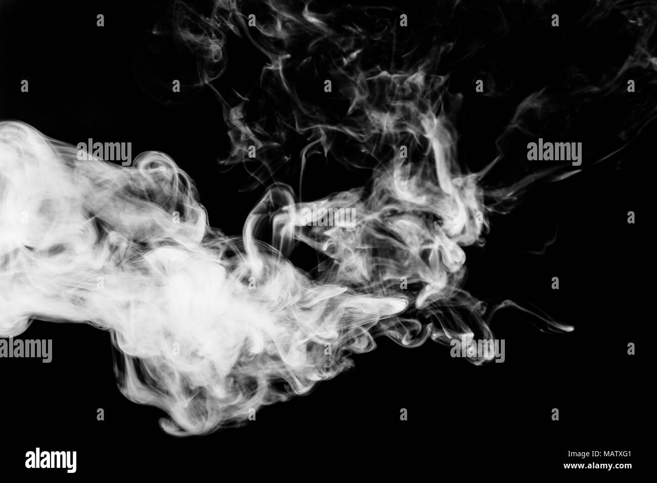 Cloud of white smoke on a black isolated background. Background from the  smoke of vape Stock Photo - Alamy