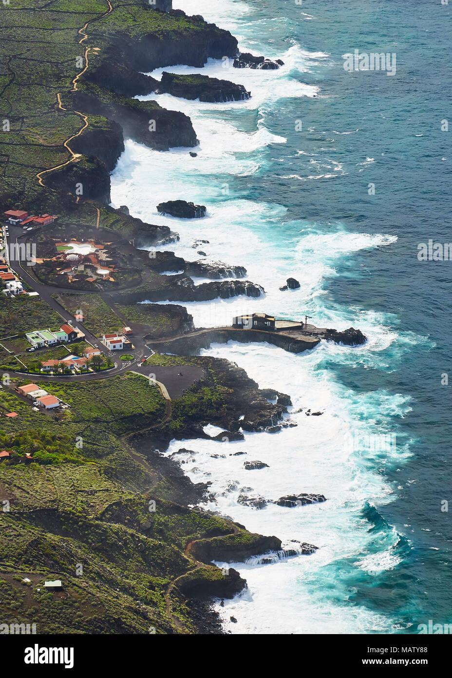 View of La Frontera gulf coastline and the Punta Grande Hotel from the Mirador de la Peña overlook in El Hierro, Canary Islands, Spain Stock Photo