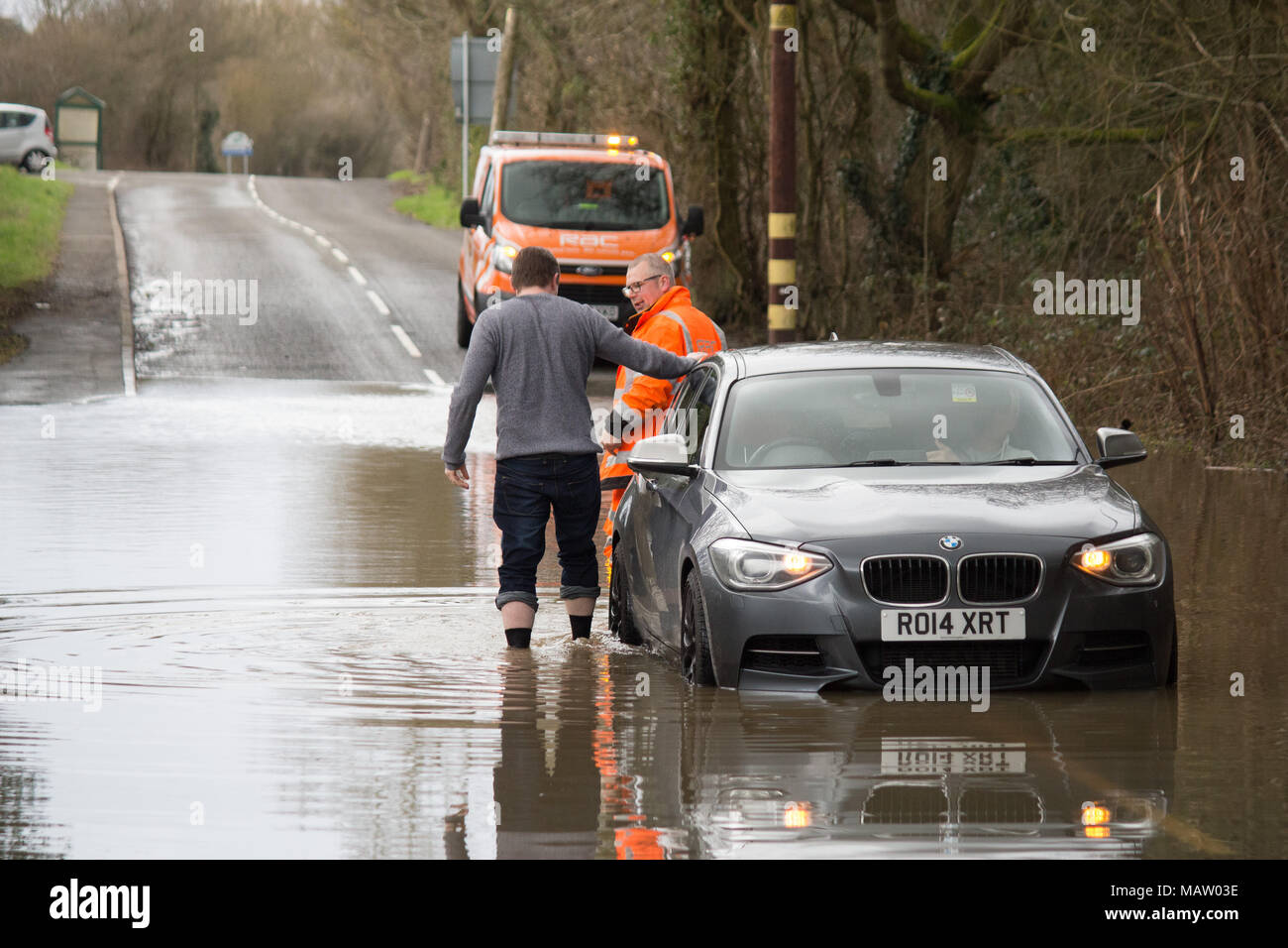 A car is stranded in flooded water from the River Anker on the Polesworth Road near Tamworth