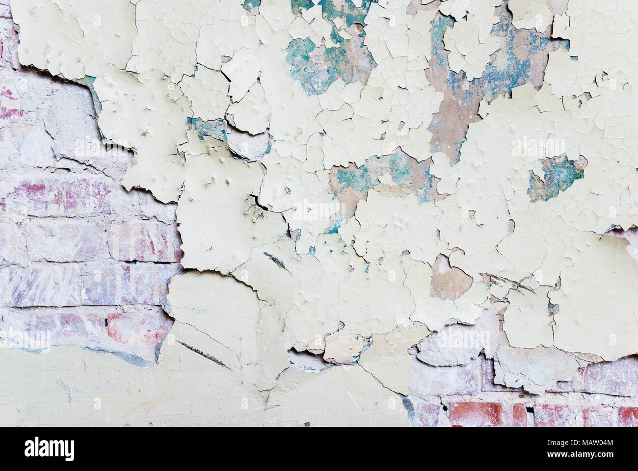 Old paint peeling from wall texture background Stock Photo