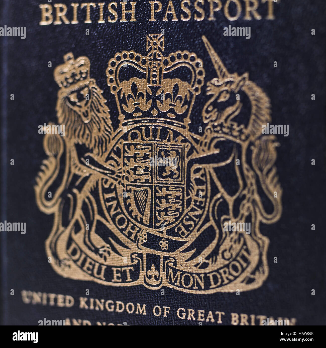 Closeup Of Old Style Blue British Passport Cover With Gold Crest
