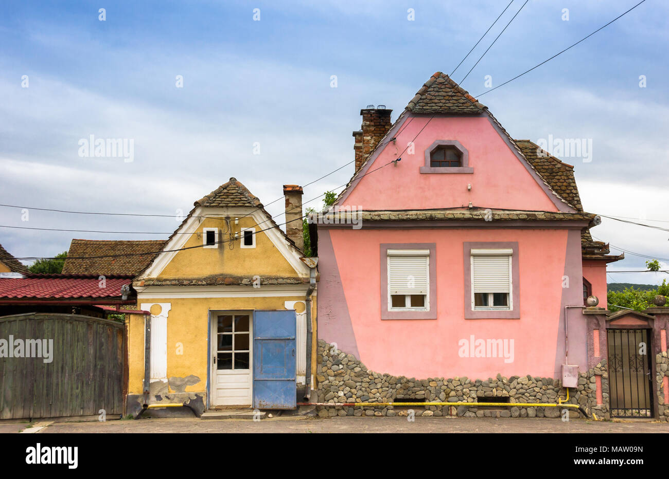 Typical small and colorful transylvanian houses in Romania Stock Photo
