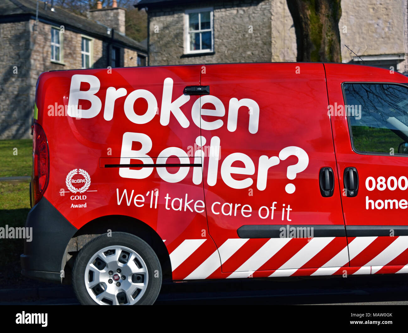 'Broken Boiler? We'll take care of it.' logo on side of van. Kendal, Cumbria, England, United Kingdom, Europe. Stock Photo