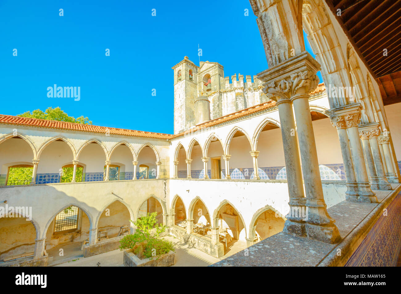 Tomar, Portugal - August 10, 2017: aerial view of Claustro da Lavagem with azulejos in Templar Castle of Tomar and Church of Convent of Christ on blue sky. Unesco Heritage and popular place. Stock Photo