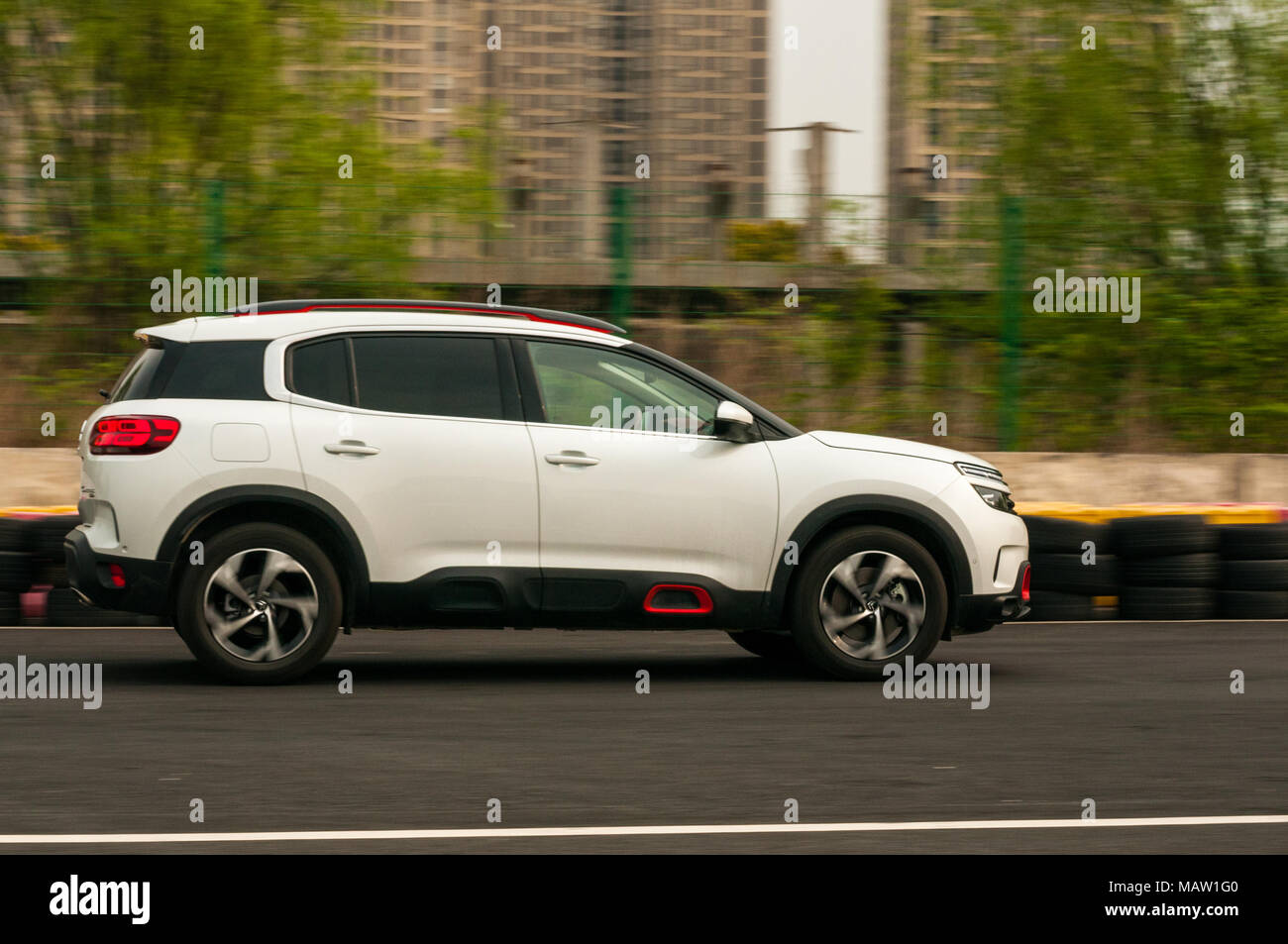 Citroen C5 Aircross being driven on a track used for drag racing as on a test drive in Shanghai, China. Stock Photo