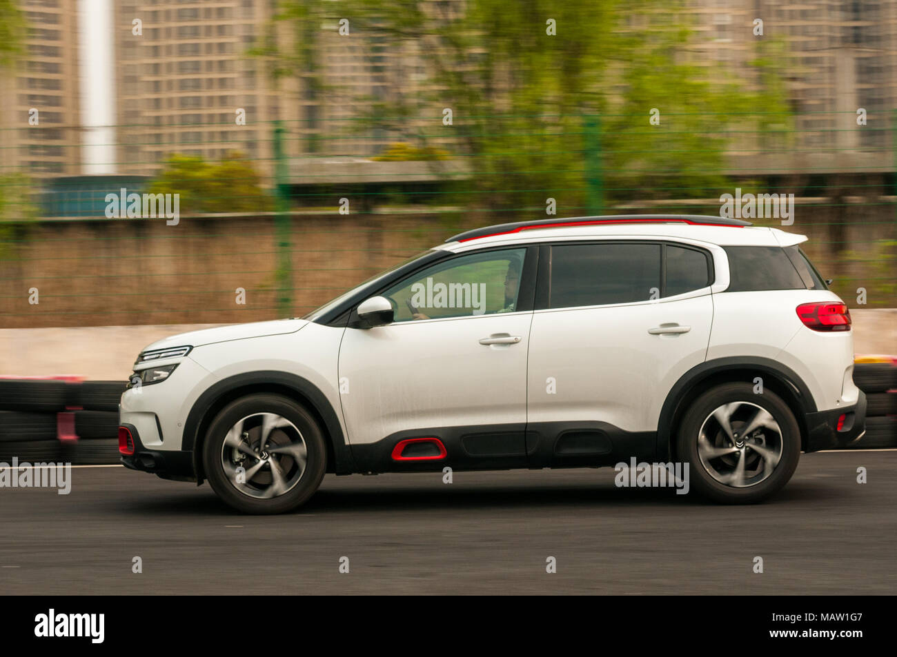 Citroen C5 Aircross being driven on a track used for drag racing as on a test drive in Shanghai, China. Stock Photo