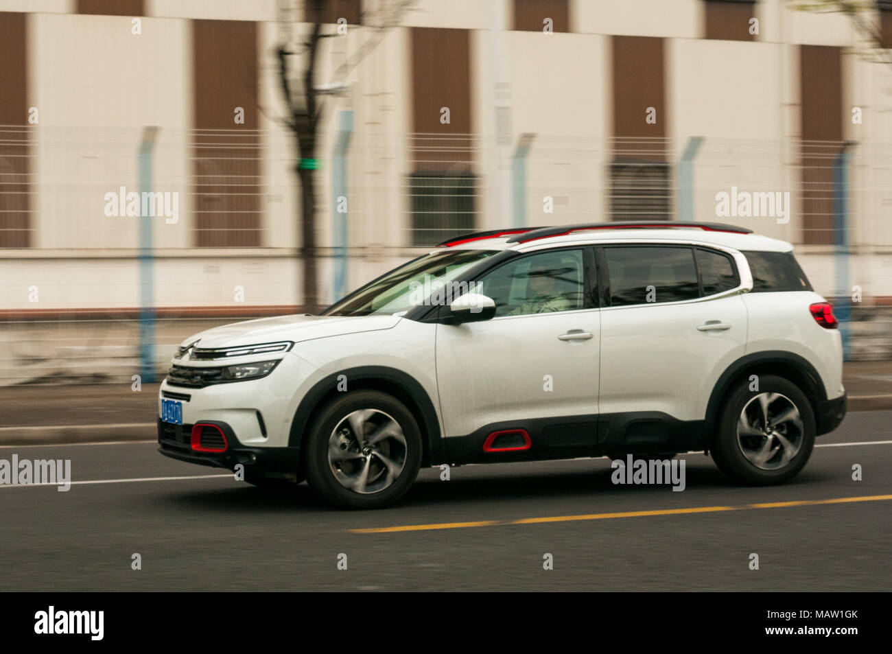 Citroen C5 Aircross being driven on a road near the former World Expo park as on a test drive in Shanghai, China. Stock Photo