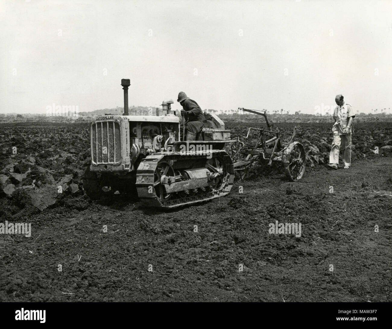 Ransoms Solotoe plough showing first ploughing in reclaimed field, Rhodesian Selection Trust, Kafue Pilot Polder, Zambia, South Rhodesia 1957 Stock Photo