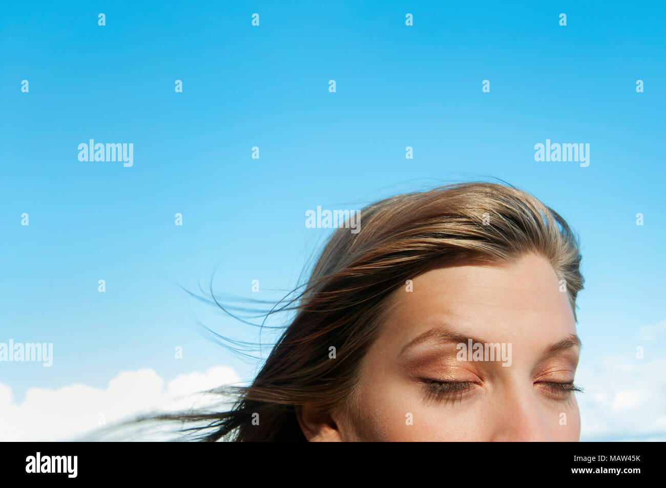 A woman with her eyes closed Stock Photo