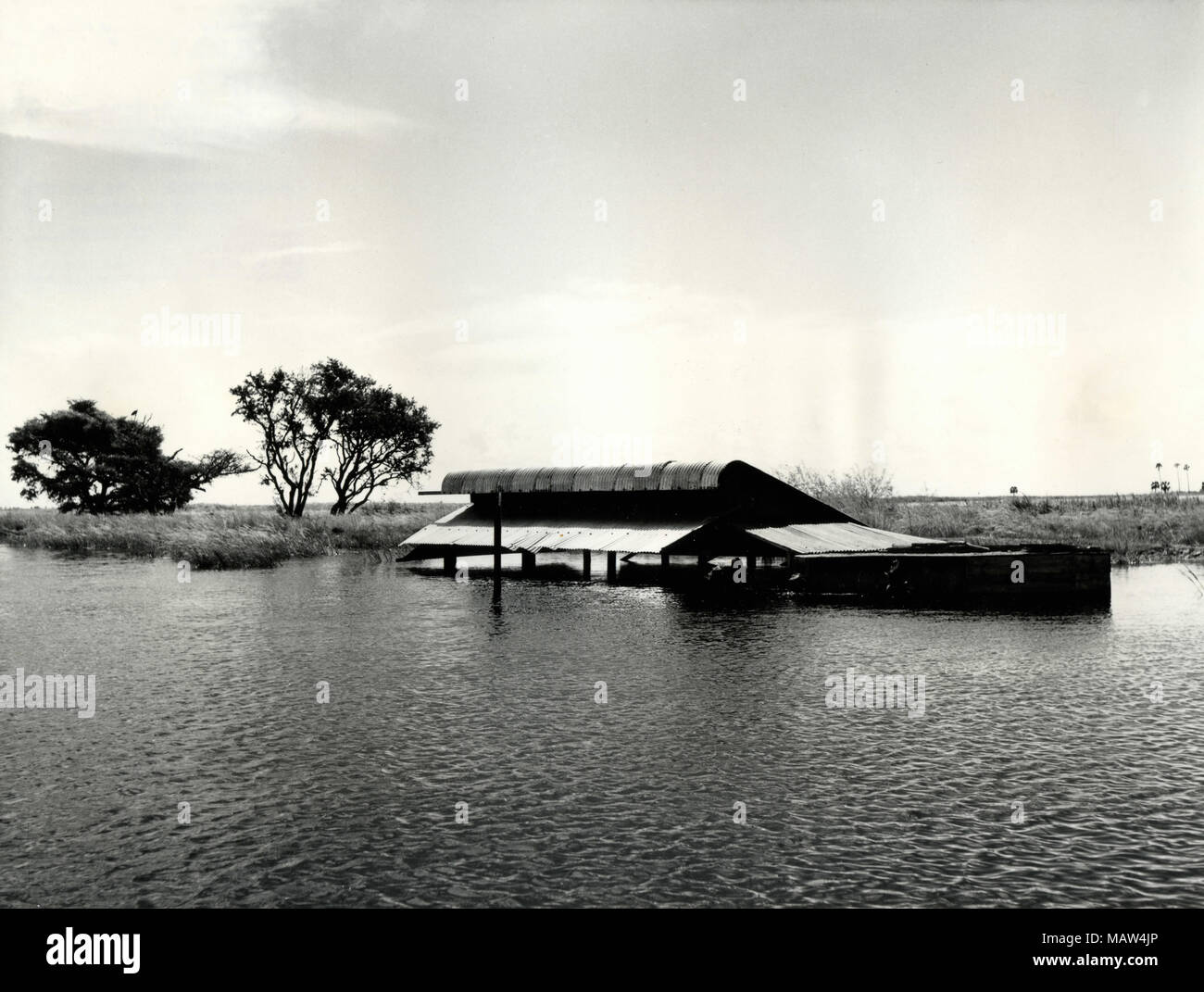 Pump house submerged, Rhodesian Selection Trust, Kafue Pilot Polder, Zambia, South Rhodesia 1957 Stock Photo