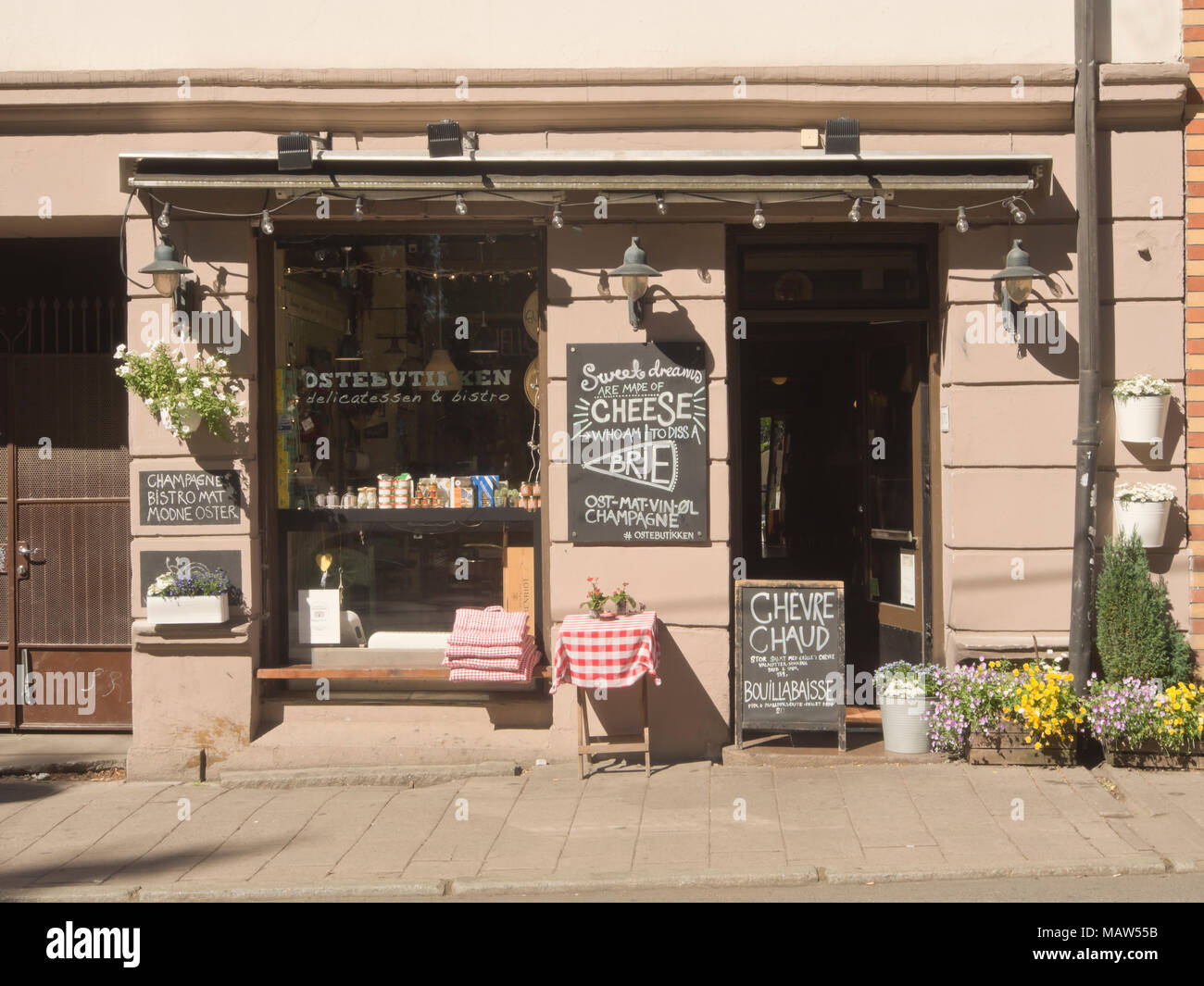 Ostebutikken, The Cheese Shop, in the trendy Grunerløkka area of Oslo  Norway with a wide selection of cheese and delicasies and a bistro menu  Stock Photo - Alamy