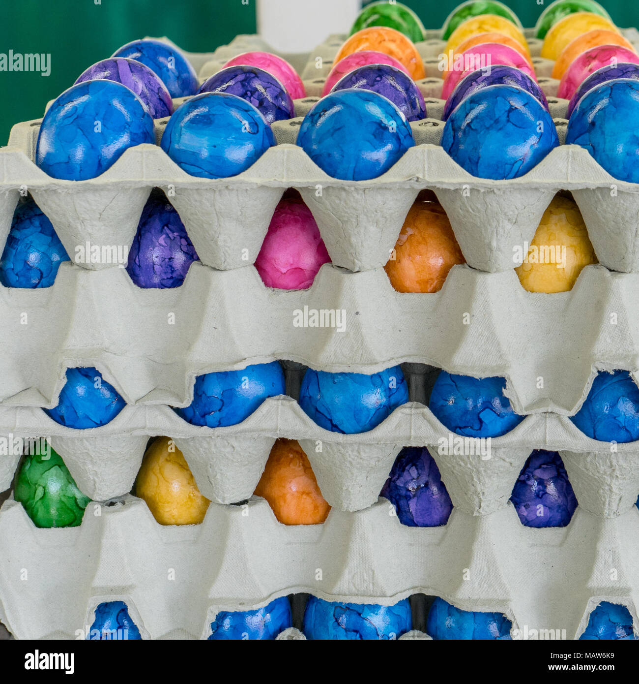 Cardboard box with colored easter eggs Stock Photo Alamy