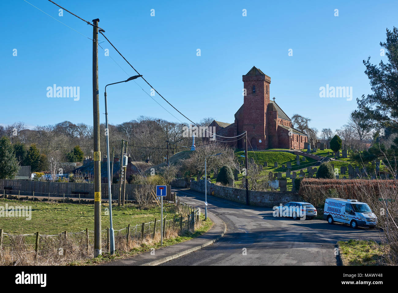 Looking from the Single Road heading into the Small Village of St Vigeans in Angus, Scotland, with its Parish Church overlooking the Area. Stock Photo
