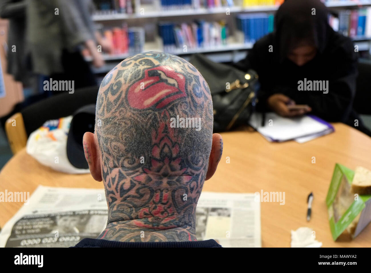 Tattooed man named Gerry in Northern England UK. Gerry was happy  for me to photograph him when I mentioned I liked his Rolling Stones tongue logo Stock Photo