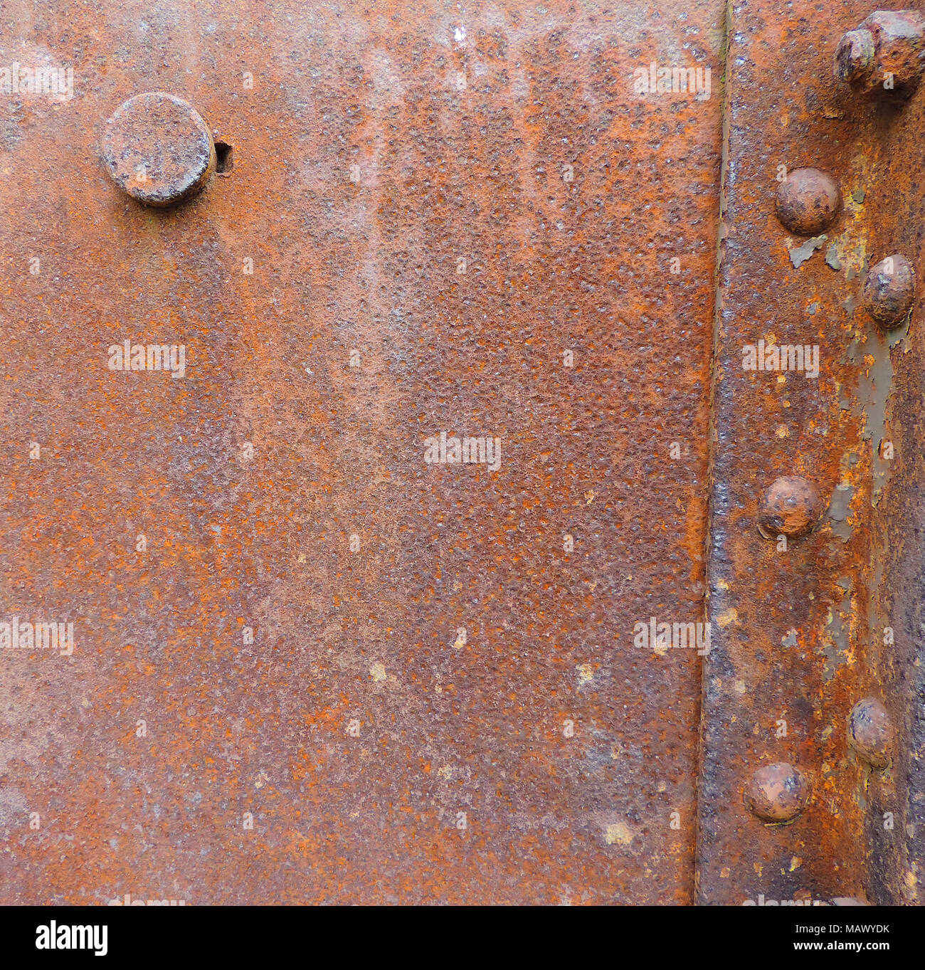 rusted iron plate or aged metal background with copy space. Stock Photo