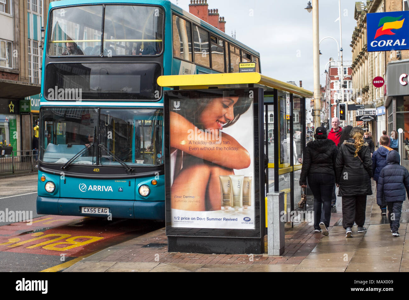 Clear Channel food advertising bus stop billboard on Arriva town centre