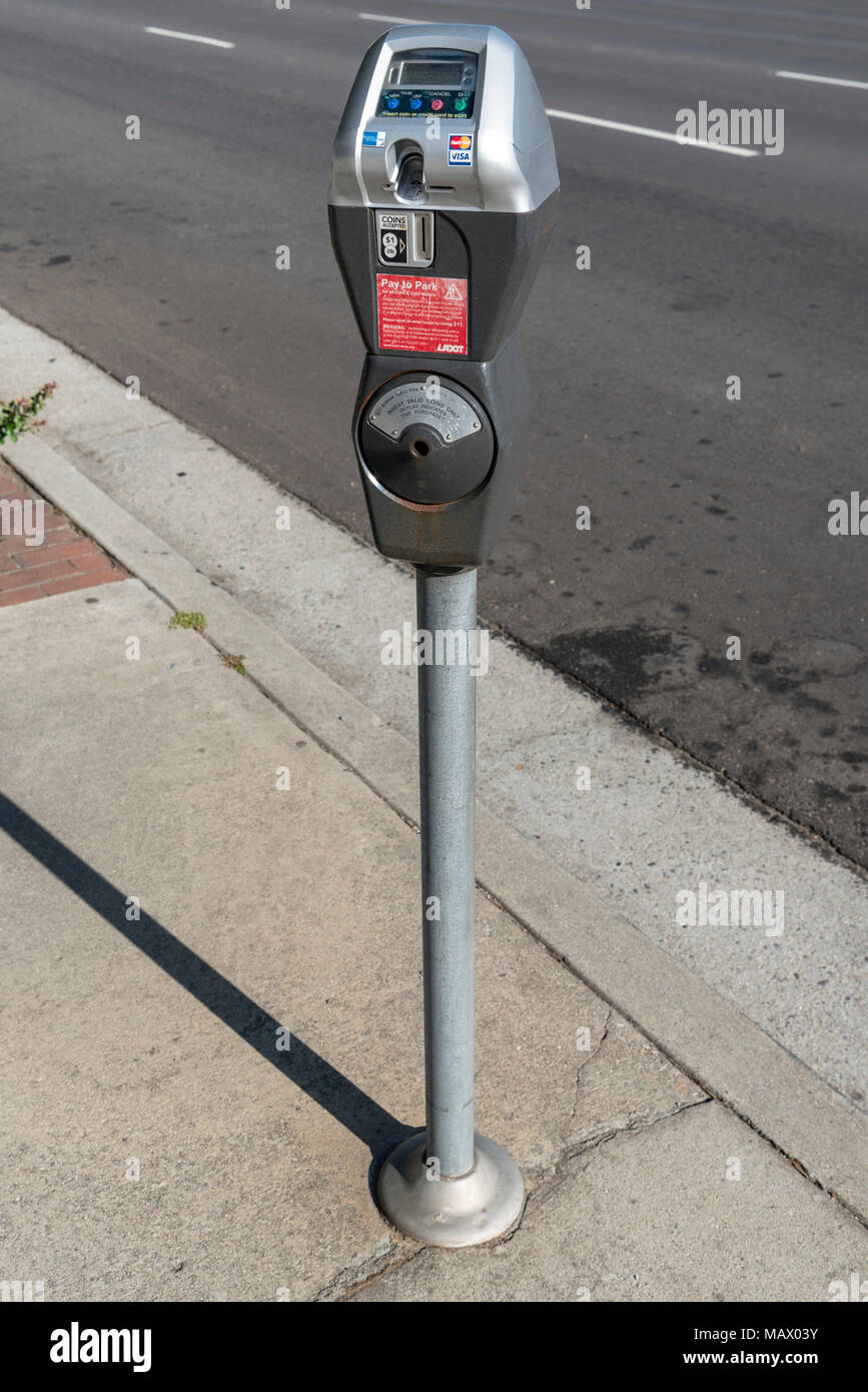 Parking meter by side of road, Sherman Oaks, Los Angeles, CA Stock