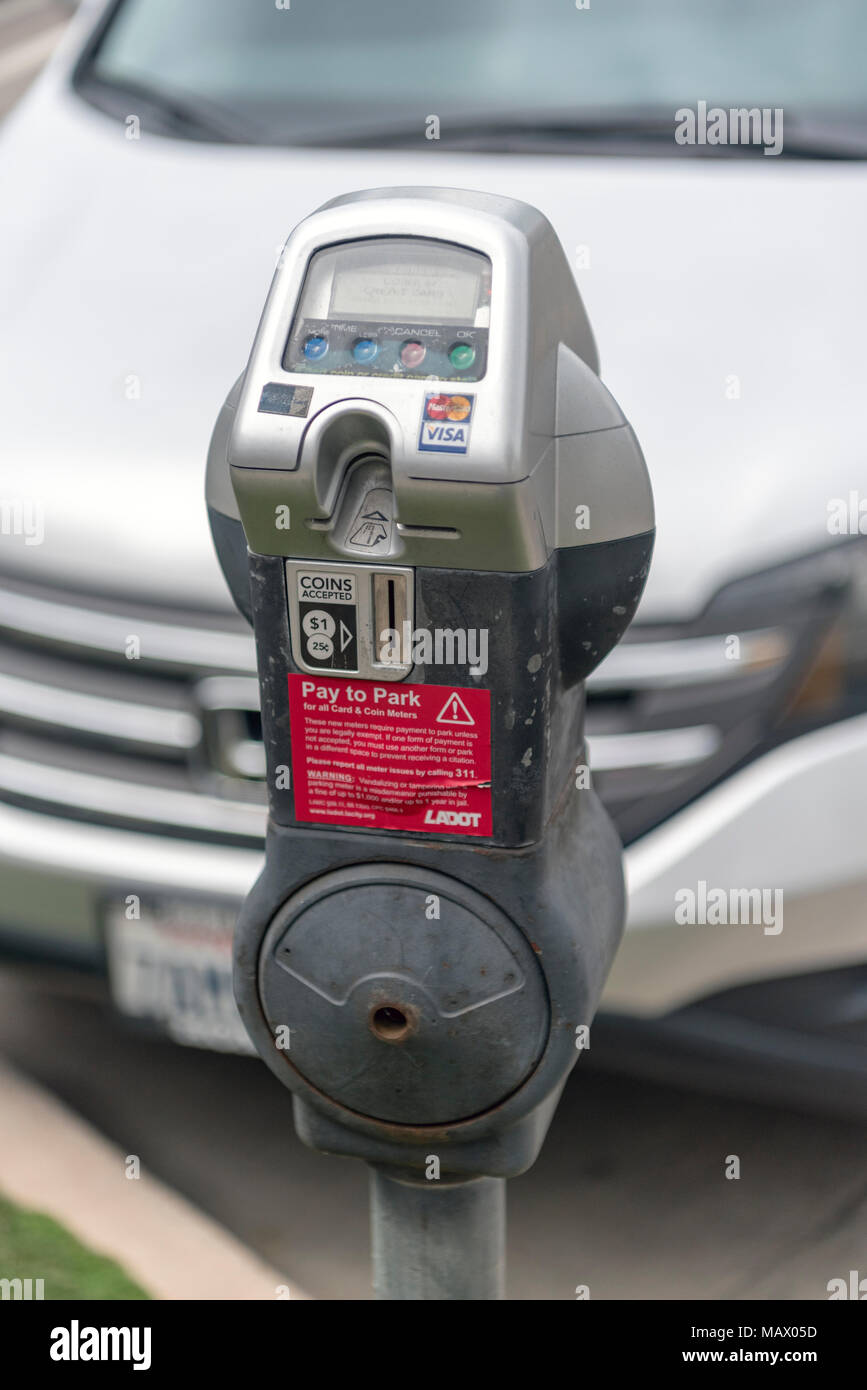 Parking meter by side of road, Sherman Oaks, Los Angeles, CA Stock