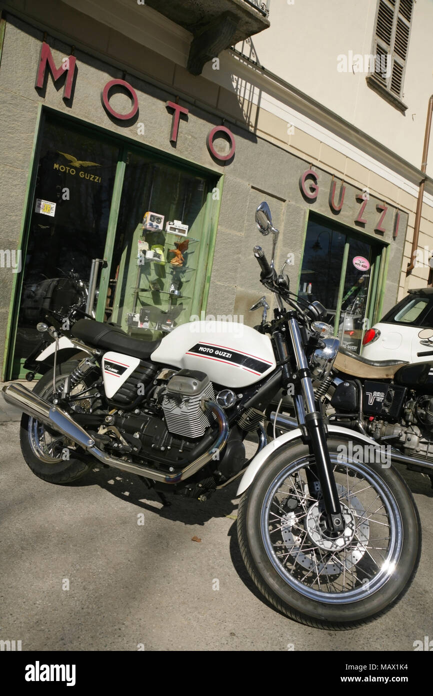 Moto Guzzi V7 Classic motorcycle outside dealership in Cuneo, Italy. Stock Photo