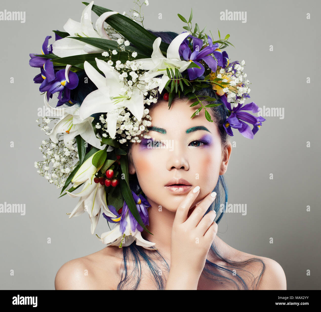 Young Cute Asian Model Woman with Blossom Flower Hairstyle and Perfect Makeup. Nice Girl with Lily and Iris Flowers Stock Photo - Alamy Young Cute Asian Model Woman with Blossom Flower Hairstyle and Perfect Makeup. Nice Girl with Lily and Iris Flowers Stock Photo - Alamy