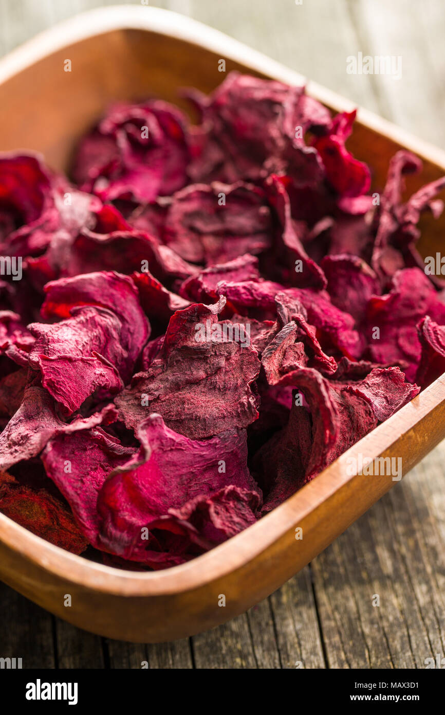 Dried beetroot chips in bowl. Stock Photo
