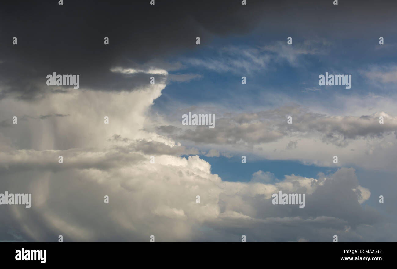 Big clouds of thunderstorms for backgrounds, rainy clouds moving over the sky, rainy weather Stock Photo