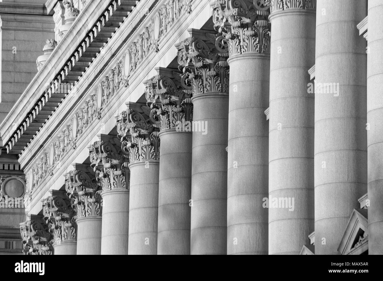 A series of Corinthian Columns shot at sunset in Black & White, this was taken in lower Manhattan at the old customs house i Stock Photo