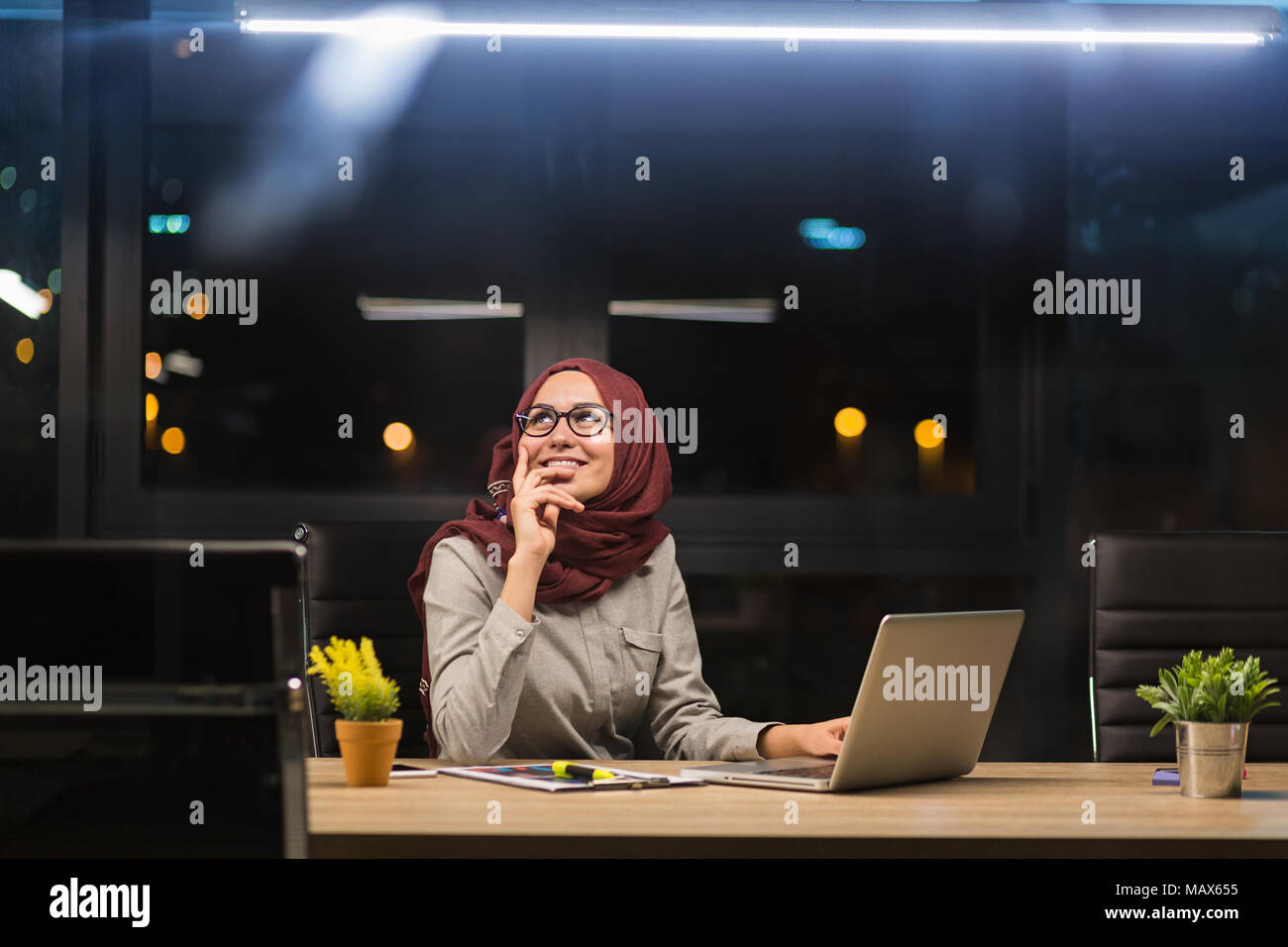 Arab lady working at the office Stock Photo