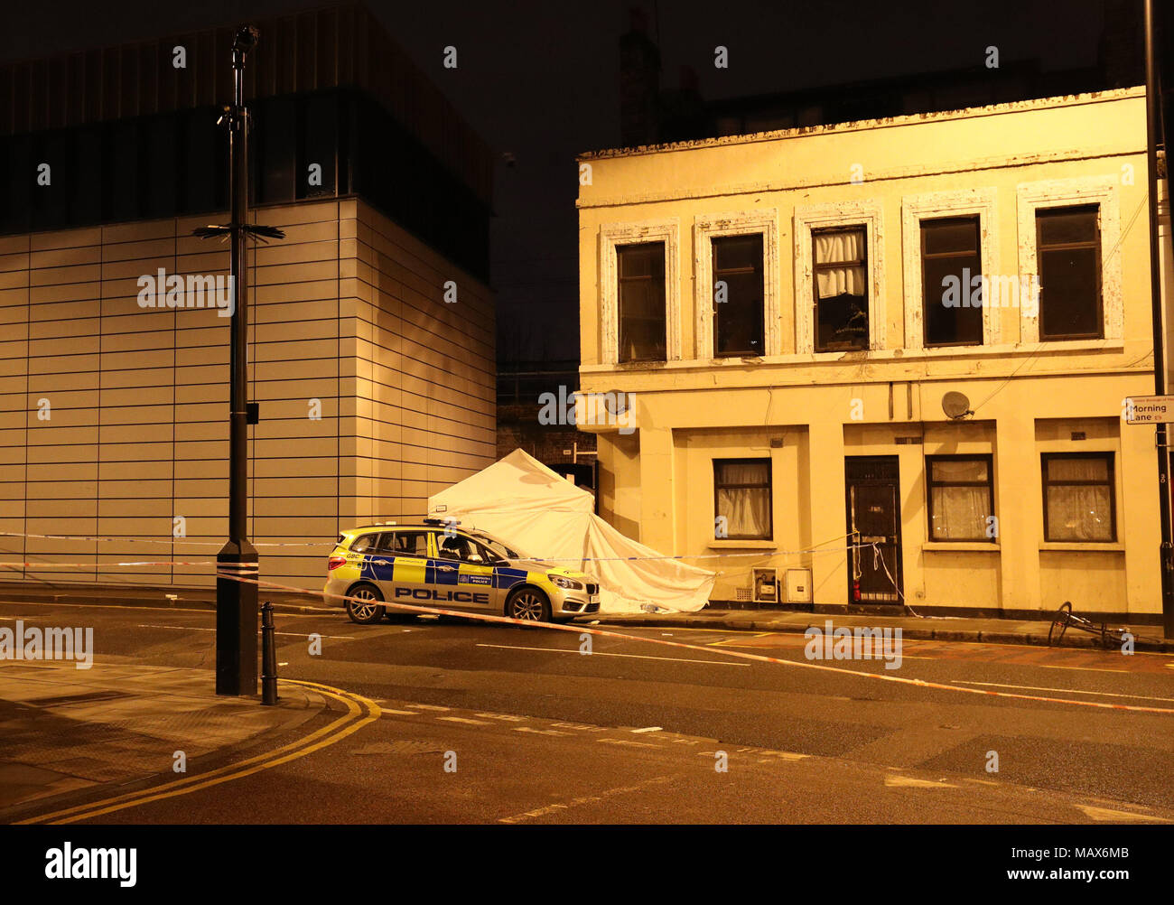 The scene in Link Street and Morning Lane, Hackney, east London after a man in his 20s has died after being stabbed. Stock Photo