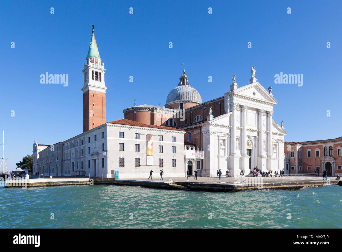 Isola di San Giorgio Maggiore from Basino San Marco and the Giudecca Canal, Venice, Veneto, Italy on a blue sky sunny day. Designed by Palladio Stock Photo