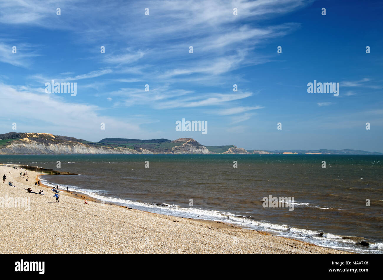 UK,Dorset,Lyme Regis,Town Beach looking across Lyme Bay towards Golden Cap & The Jurassic Coastline Stock Photo