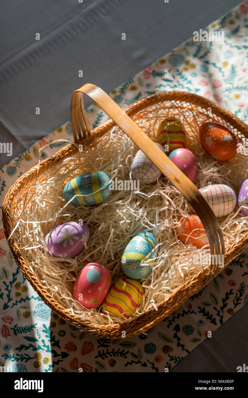 Colorful decorated easter eggs in a basket Stock Photo