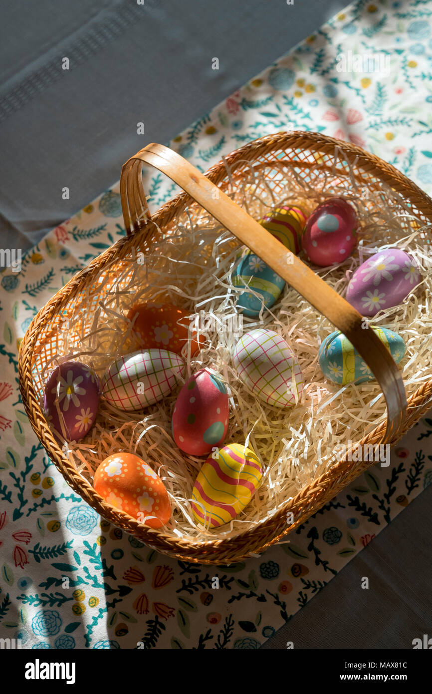 Colorful decorated easter eggs in a basket Stock Photo