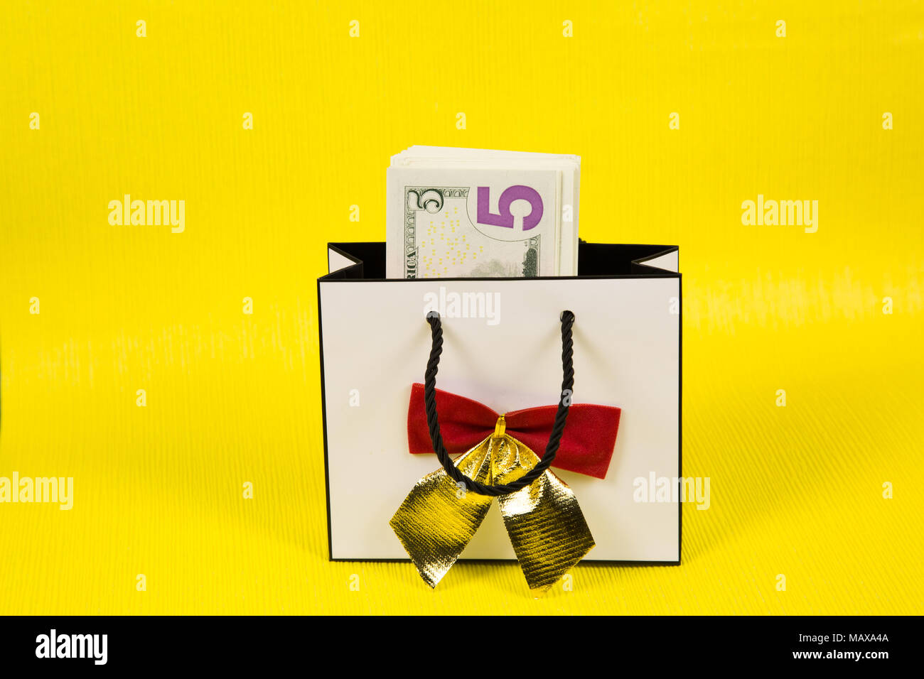 Download Paper Money In A Beautiful Gift Box With A Bow On A Bright Yellow Background Stock Photo 178828954 Alamy PSD Mockup Templates